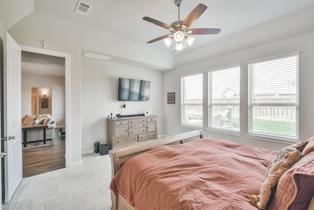 bedroom with ceiling fan and carpet