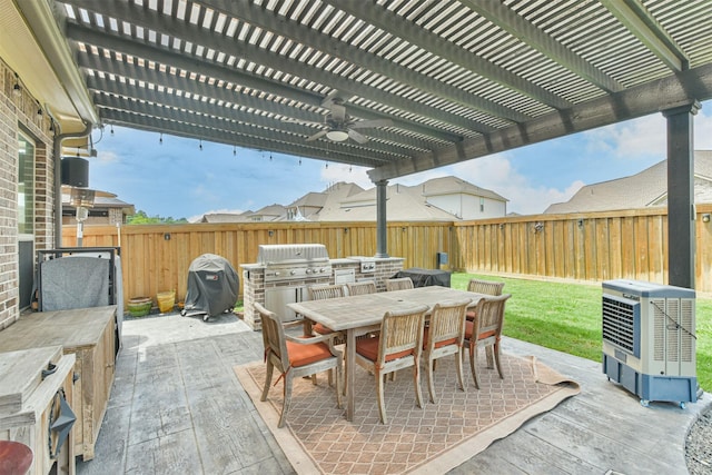 view of patio / terrace with a pergola and grilling area