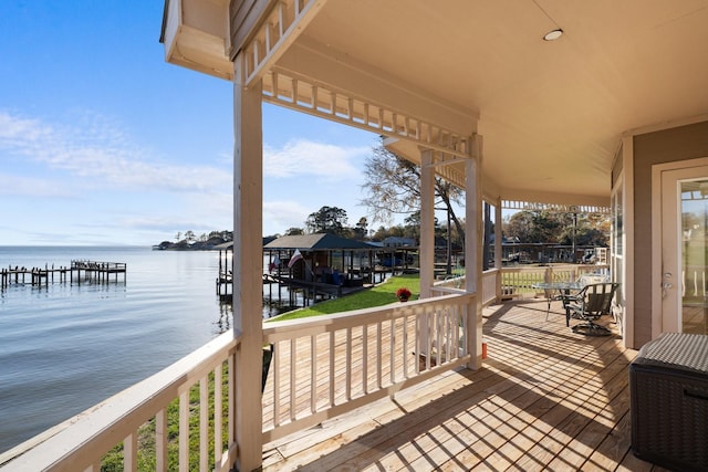 deck featuring a dock and a water view