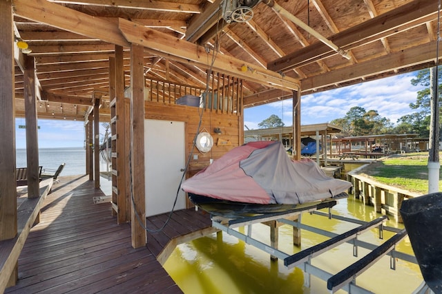 dock area with a water view