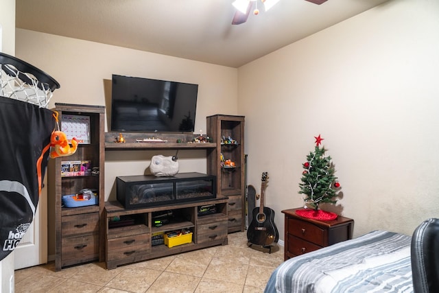 bedroom featuring light tile patterned floors and ceiling fan