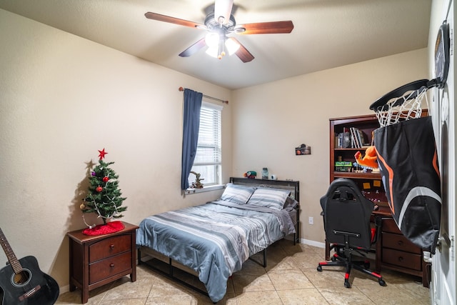 bedroom with ceiling fan and light tile patterned floors