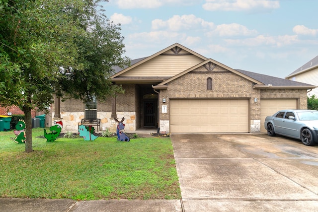 view of front facade with a front lawn and a garage