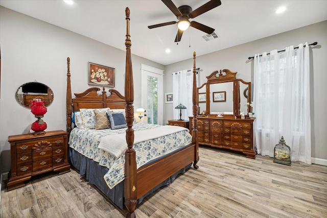 bedroom featuring ceiling fan and light hardwood / wood-style flooring