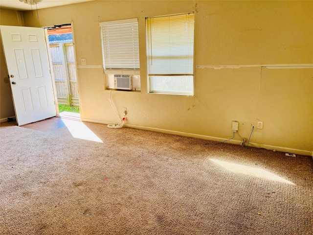 spare room with carpet flooring and cooling unit