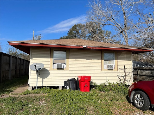 view of home's exterior with cooling unit