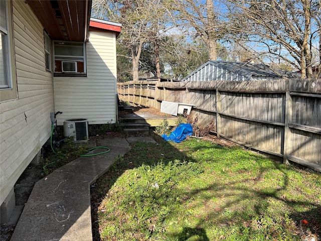 view of yard featuring central AC unit