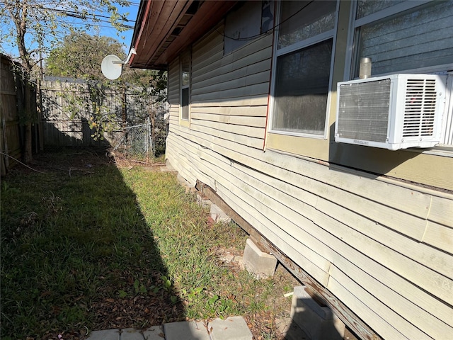 view of home's exterior with cooling unit