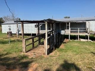 view of yard with an outdoor structure