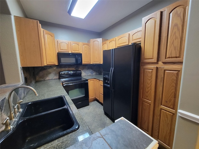 kitchen with black appliances, sink, decorative backsplash, light brown cabinetry, and light tile patterned flooring