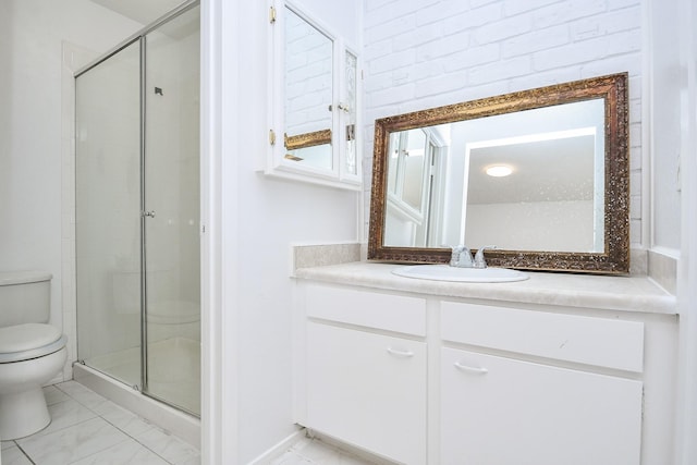 bathroom featuring vanity, an enclosed shower, and toilet