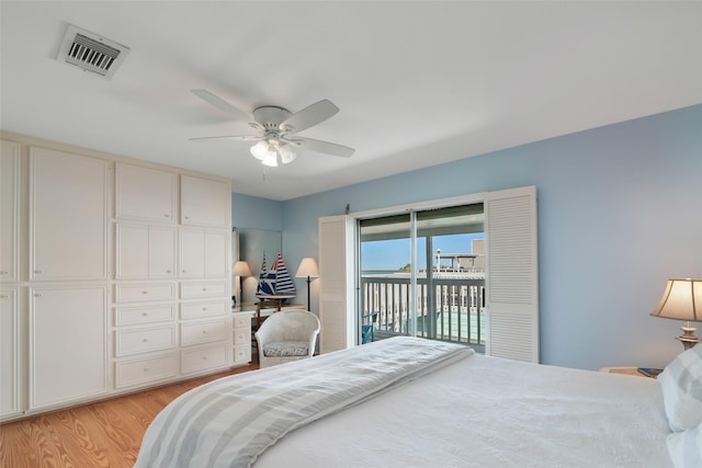 bedroom with light wood-type flooring, access to outside, and ceiling fan