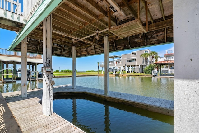 view of dock with a water view