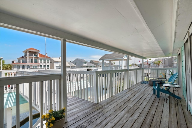 wooden deck with a water view