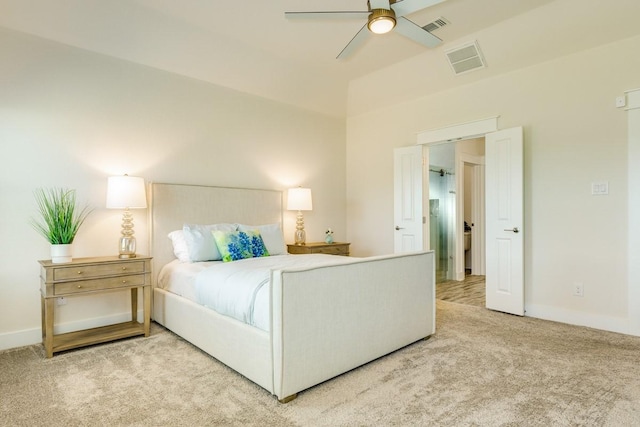 carpeted bedroom featuring ceiling fan and lofted ceiling