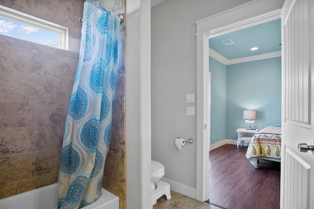 bathroom with toilet, shower / bathtub combination with curtain, and ornamental molding