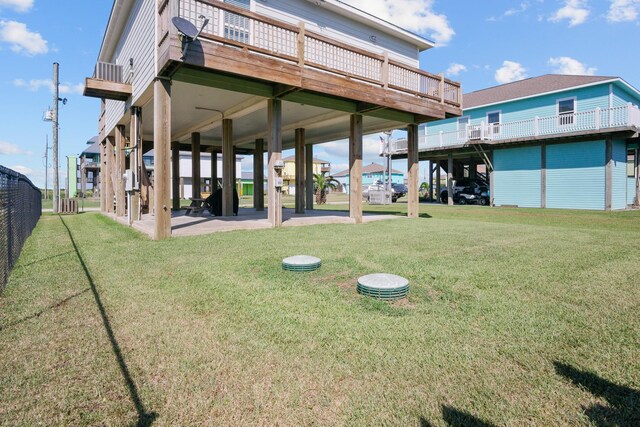 view of yard featuring a wooden deck