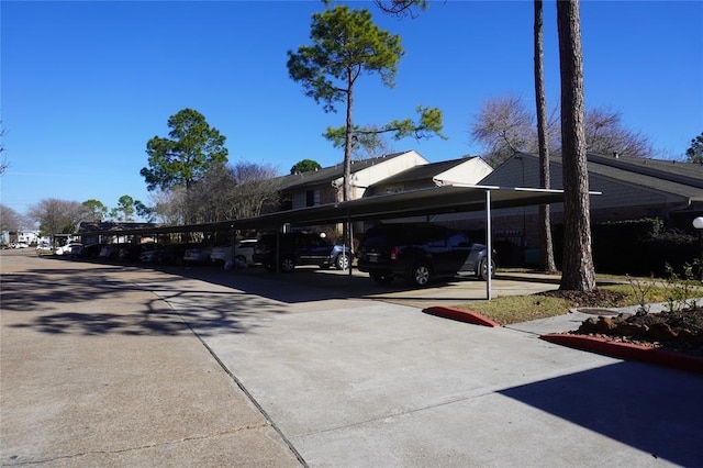 view of car parking with a carport