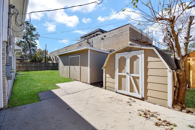 view of outbuilding with a lawn