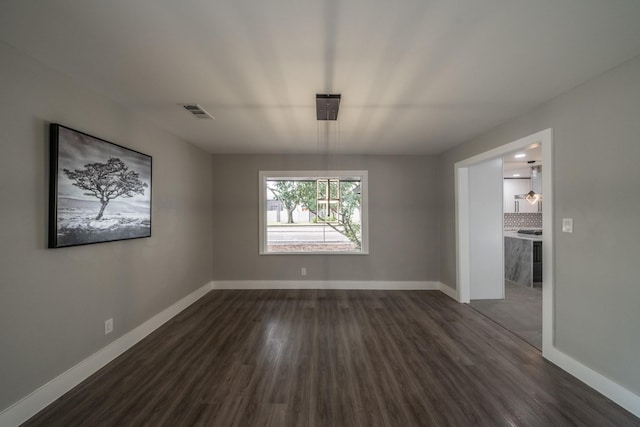 unfurnished dining area with dark hardwood / wood-style floors