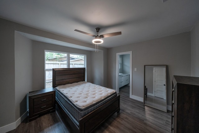 bedroom with dark hardwood / wood-style floors and ceiling fan