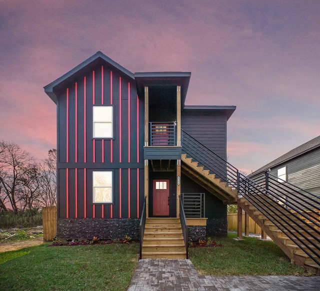 contemporary home featuring a yard