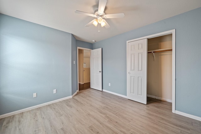 unfurnished bedroom with a closet, ceiling fan, and light hardwood / wood-style flooring