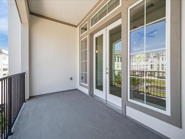 balcony featuring french doors