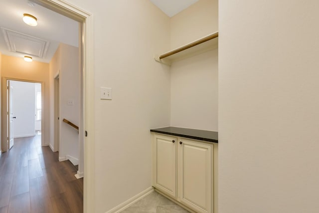 corridor with light hardwood / wood-style flooring