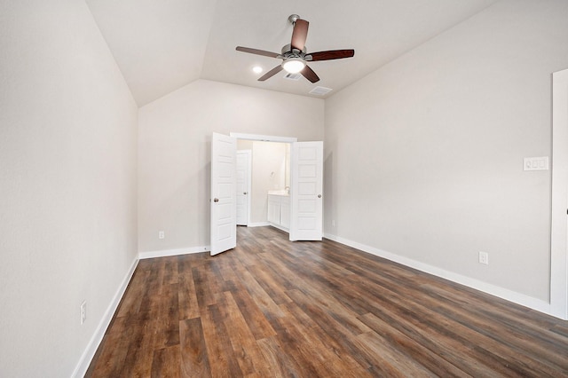 unfurnished bedroom with dark hardwood / wood-style flooring, ceiling fan, and lofted ceiling