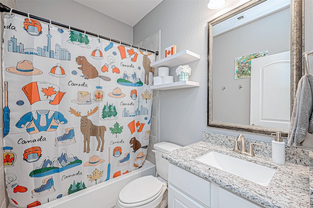 full bathroom featuring shower / bathtub combination with curtain, vanity, and toilet