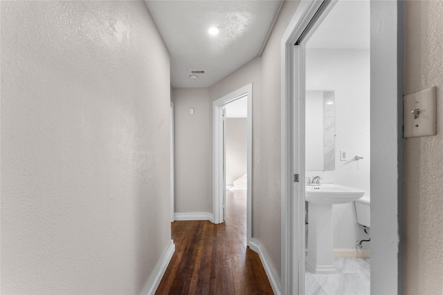 hall featuring dark hardwood / wood-style flooring