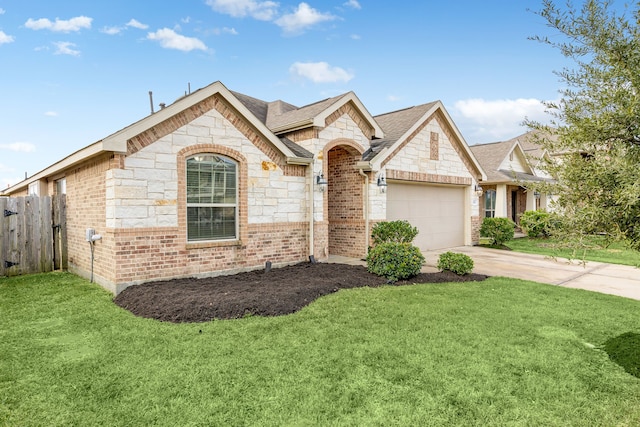 view of front facade with a front lawn and a garage