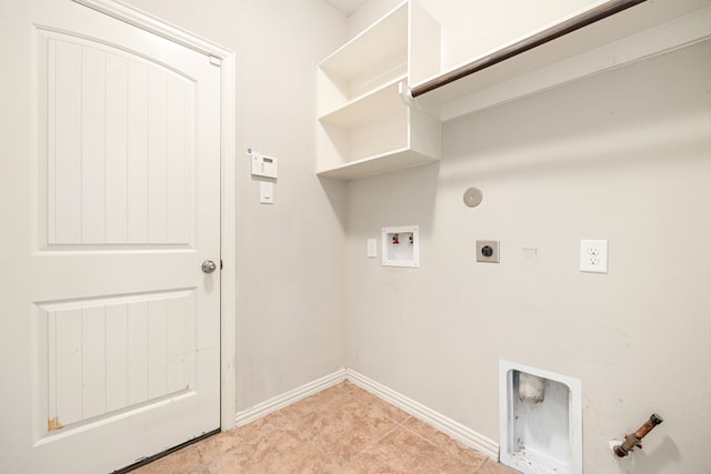 laundry room featuring gas dryer hookup, hookup for a washing machine, light tile patterned floors, and hookup for an electric dryer