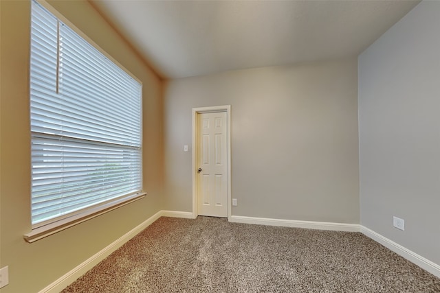 unfurnished room with carpet floors