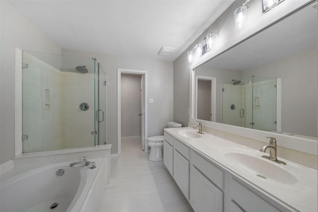 full bathroom featuring shower with separate bathtub, vanity, and toilet