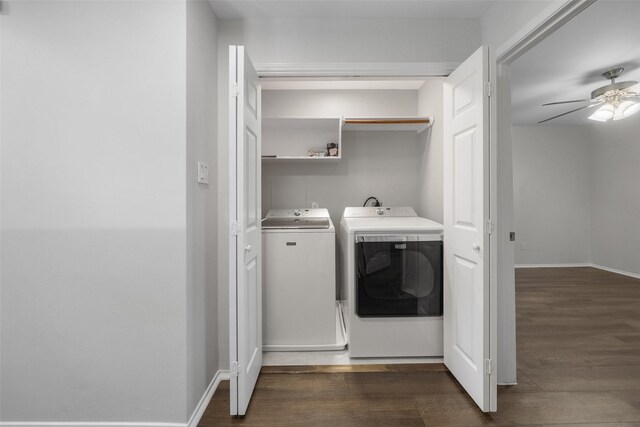 laundry area featuring ceiling fan, dark hardwood / wood-style floors, and separate washer and dryer