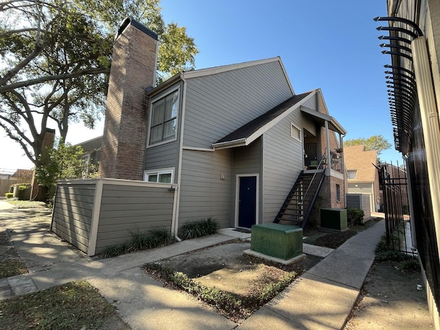 view of front of home with central air condition unit