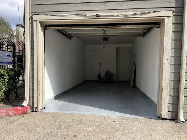 garage featuring a garage door opener