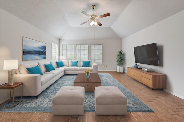 living room with vaulted ceiling and ceiling fan