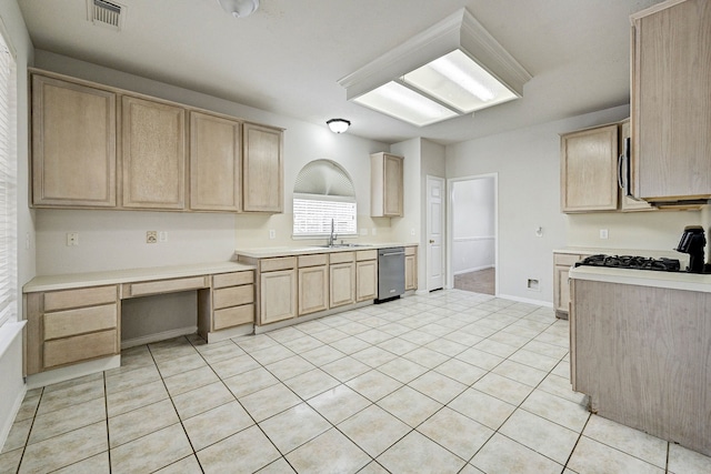 kitchen with sink, light brown cabinets, and appliances with stainless steel finishes