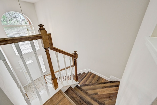 stairs with tile patterned flooring