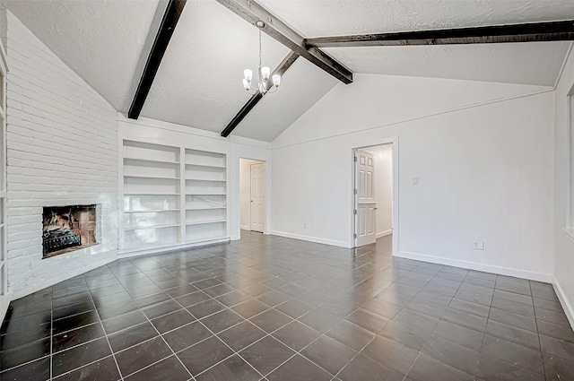 unfurnished living room with built in shelves, a textured ceiling, a large fireplace, a chandelier, and vaulted ceiling with beams