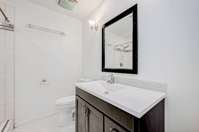 bathroom featuring tile patterned flooring, vanity, toilet, and a shower