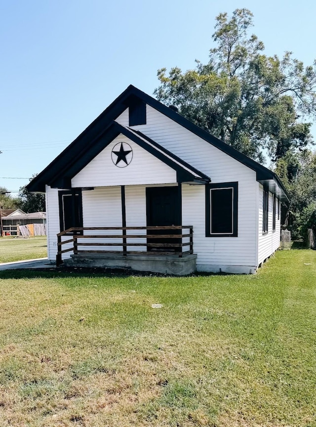 view of front of home with a front yard