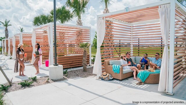 view of patio with outdoor lounge area and a pergola