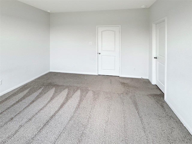 empty room with carpet floors