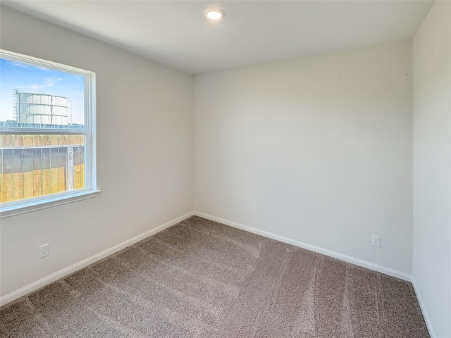 spare room with carpet flooring