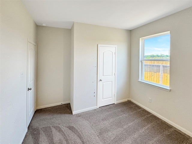 unfurnished bedroom with carpet