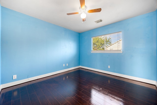 unfurnished room featuring hardwood / wood-style flooring and ceiling fan